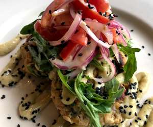 Sesame Chick Pea Cakes with dill hummus vinaigrette